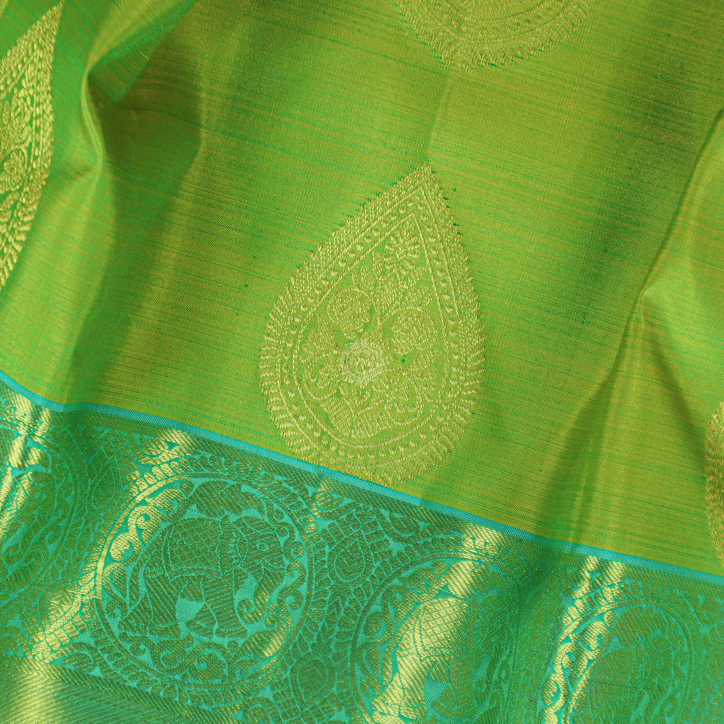 VM23071858 Light Olive Green with Greenish Cyan Wedding silk saree