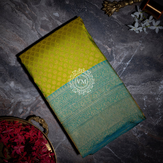 WS54 Mustard Green Silk with Brocade Gold Tissue Zari and Dusty Teal Traditional Border