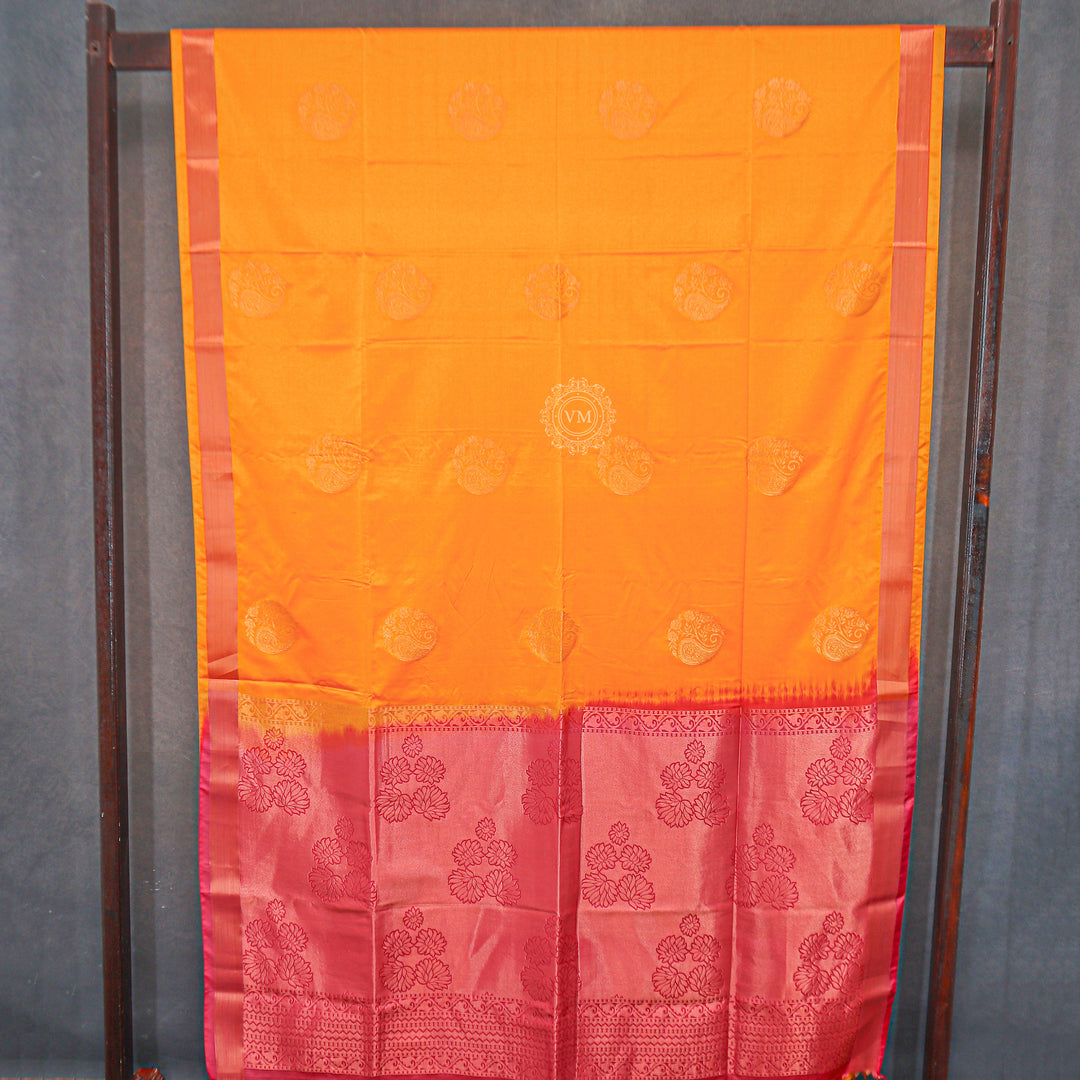 VM23083525 Yellowish orange with Pinkish Semi soft silk saree